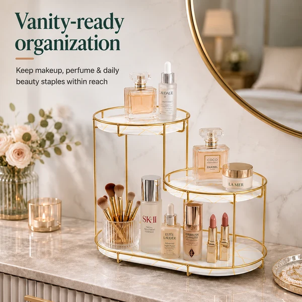 3-Tier Oval Cascading Vanity Stand styled on a bathroom counter with perfumes and skincare
