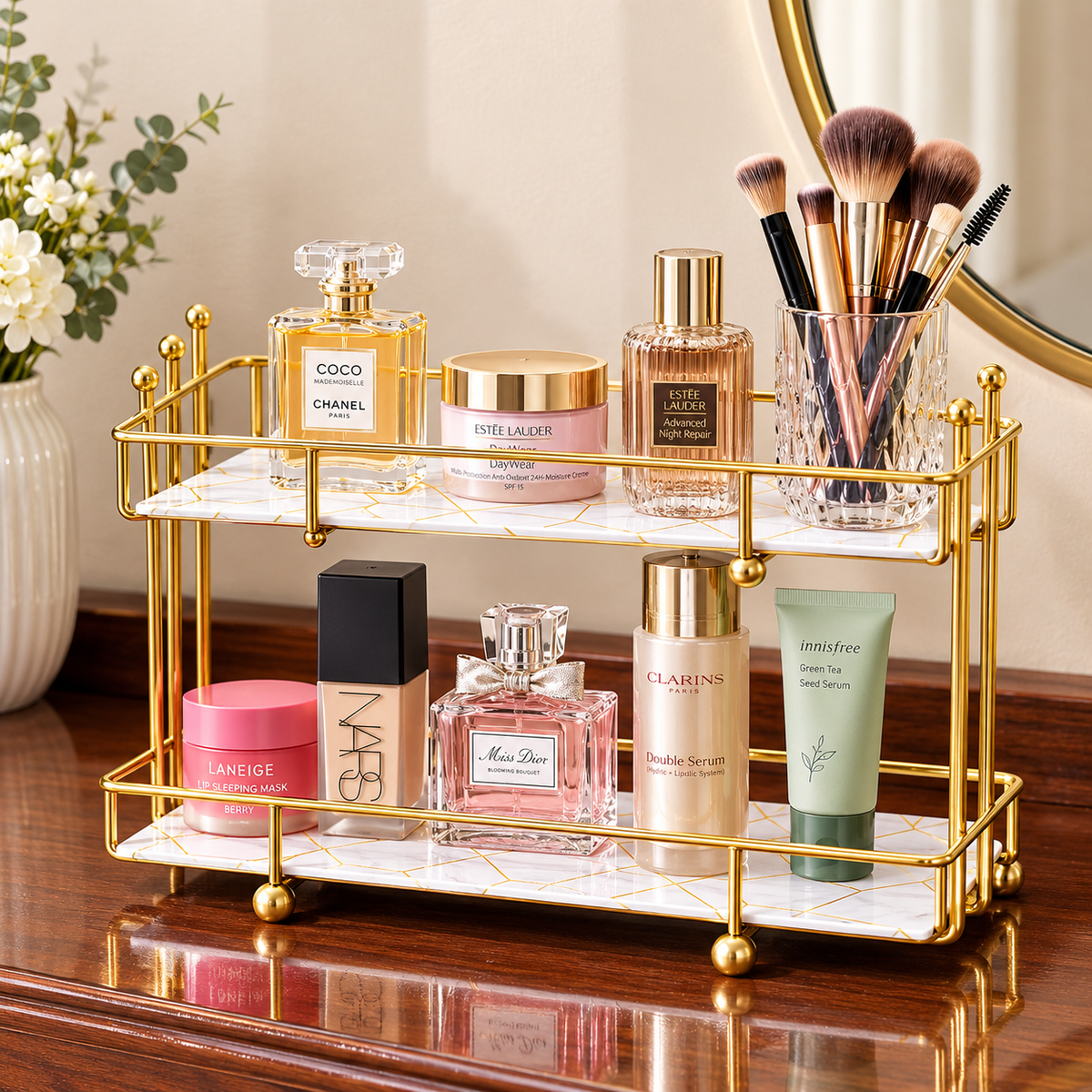 Golden Rail Vanity Tray with Chanel and Estée Lauder products on a wood dresser